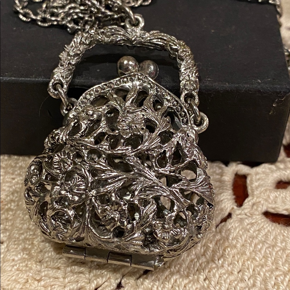 Silver Tone Purse Necklace. Opens Up. Very long chains.